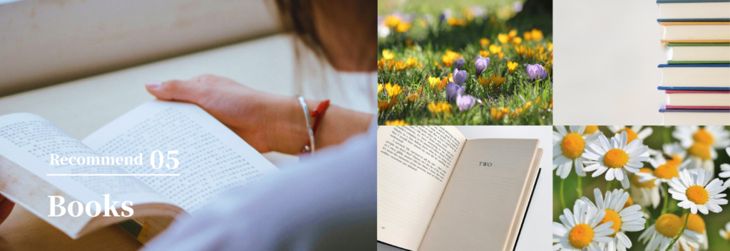 読書する手元と花や本を組み合わせた春の読書イメージ画像