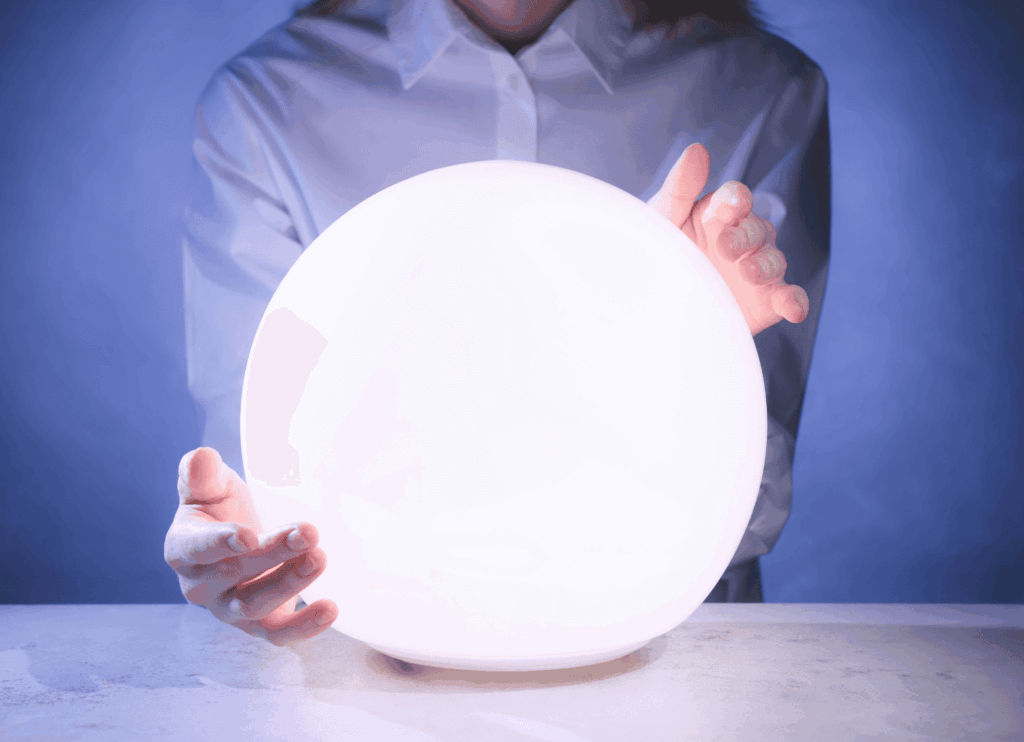 紫の空間で白く輝く球体に両手をかざす月華。その姿は神秘的な儀式を思わせます。